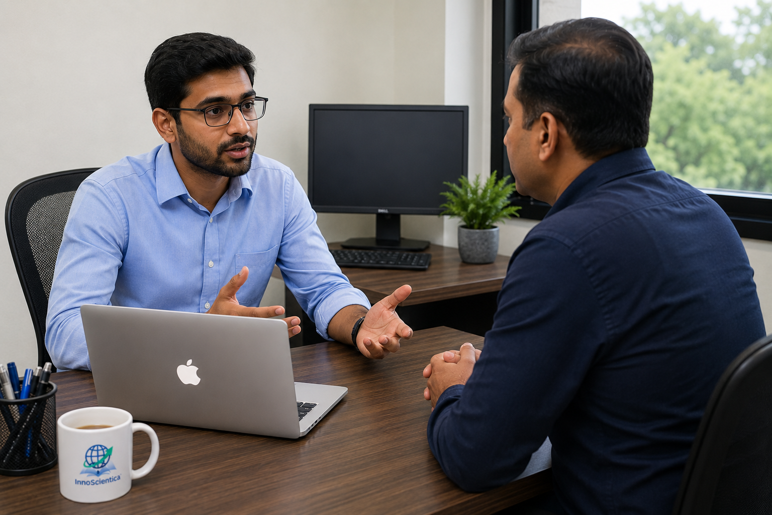 Research advisor discussing a grant proposal with a researcher